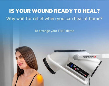Bioptron light therapy device used near a healing wound for recovery support